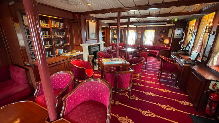 Guests can relax in the ship’s library.