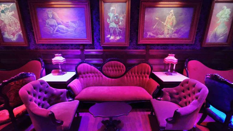 The Haunted Mansion Parlor features nods to the theme park ride of the same name.
