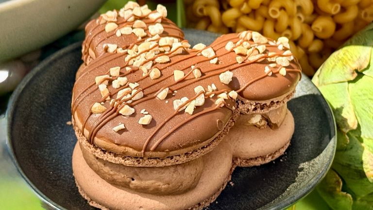 The beloved Mickey-shaped chocolate and Snickers bar macaron is back for another year.