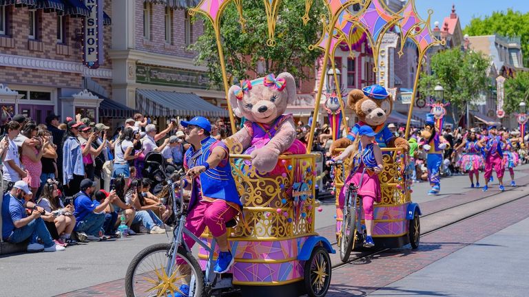 Duffy and ShellieMay lead the “Celebrate Happy Cavalcade” through Disneyland Park.