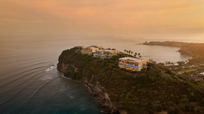 Families seeking a remote option can stay at the beachfront Six Senses Grenada La Sagesse.