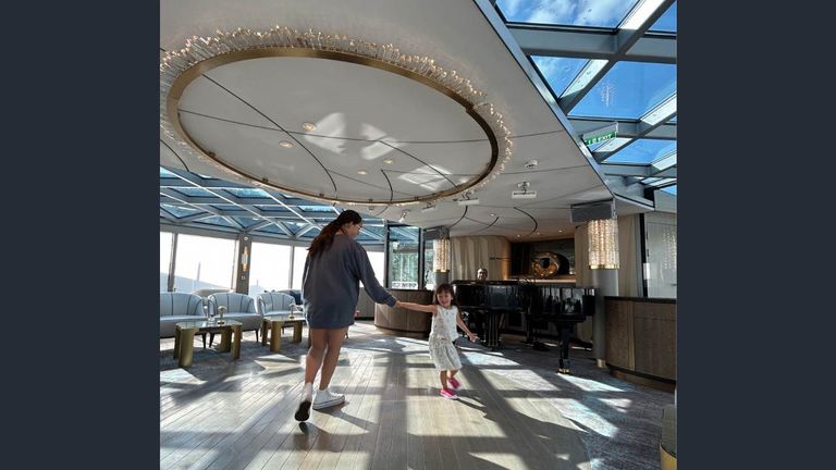 Live piano music inspired the writer's daughters to dance in the Palm Court.