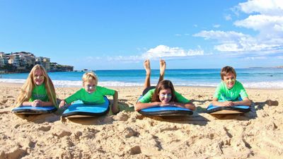 A surf lesson at Australia’s iconic Bondi Beach is a great activity for families.