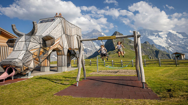 A massive wooden cow draws families to Alpine Herdsman’s Playground.