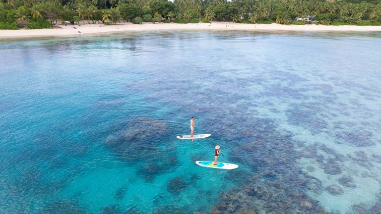 Vomo Island Fiji has activities for all ages such as Fijian cooking classes, kite making, guided paddling and coral planting.