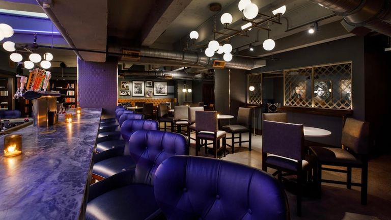 The Paramount Recreation Club, the building’s original prohibition-era speakeasy, is hidden in the Barfield Hotel’s basement.