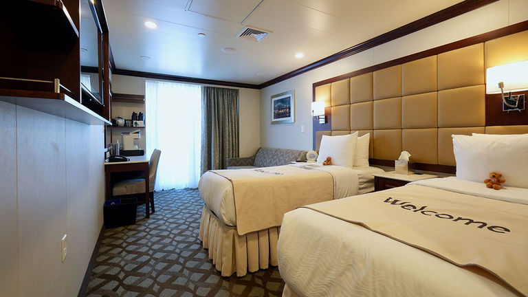 A deluxe outside stateroom with a private veranda provides plenty of space.