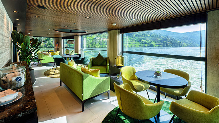 The color scheme on the ship, including in the Club Lounge, reflects the Douro’s reputation as the “river of gold.”