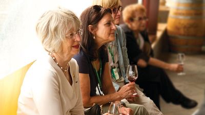 Travelers enjoy a wine tasting at Quinta dos Vales Winery in Estômbar, Portugal during a Tauck Women's-Only Departure.