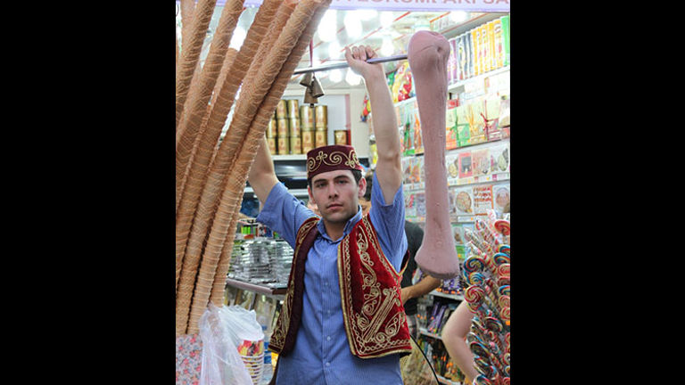 A dondurma vendor serving the thick, chewy ice-cream in Pera, Istanbul. // © 2014 Creative Commons user klearchos