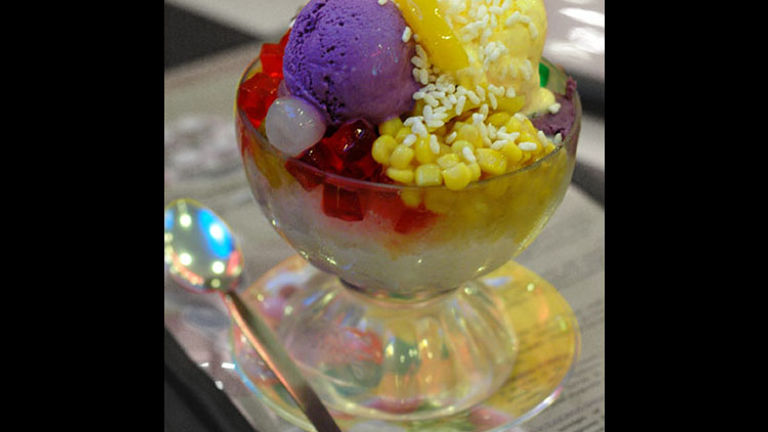 Halo halo, a Filipino dessert with shaved ice, can come with purple yam ice cream, jellies, fruit, flan and corn. // © 2014 Creative Commons user chewychua