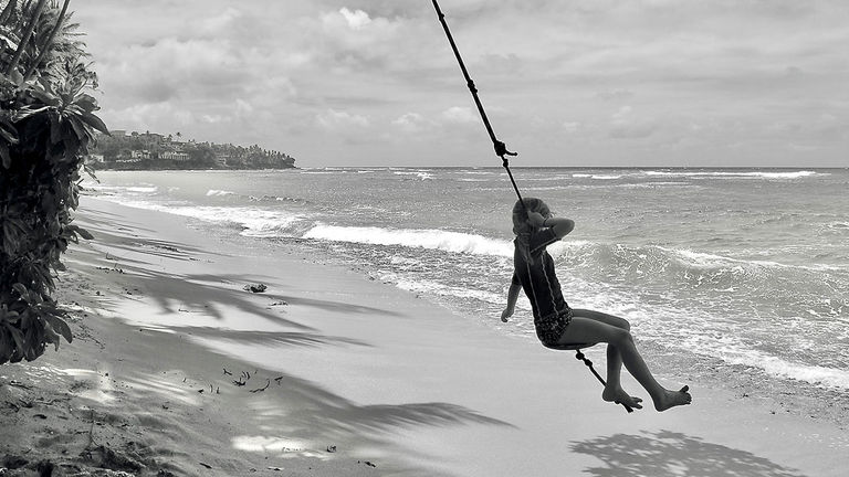 Our third-place photo was taken by Jeni Kay, who captured her daughter swinging at an Oahu beach.
