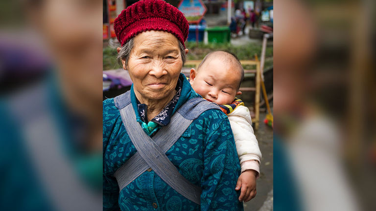 Honorable mention: A grandmother and her sleeping baby in China
