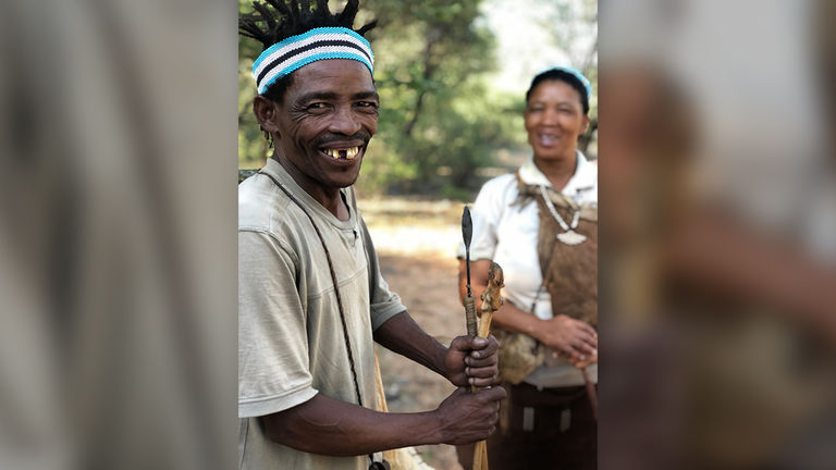 In Botswana, G Adventures guests can connect with the indigenous Sans people.