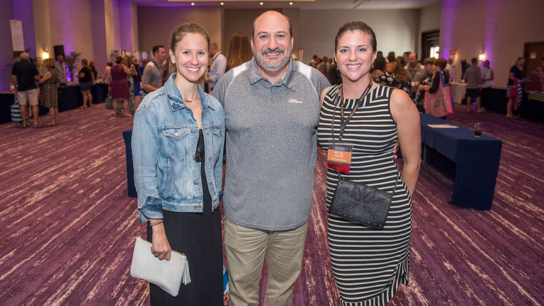 Scott Wiseman, president of Travel Impressions, with Amanda Carlow, director of sales for Travel Relations LLC (left) and Rachel McGee, director of supplier engagement, Mexico, Central and South America for Apple Leisure Group (right).