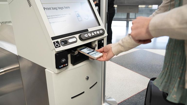 Touchless kiosks are used for printing bag tags.