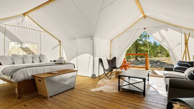 The interior of an Under Canvas glamping tent