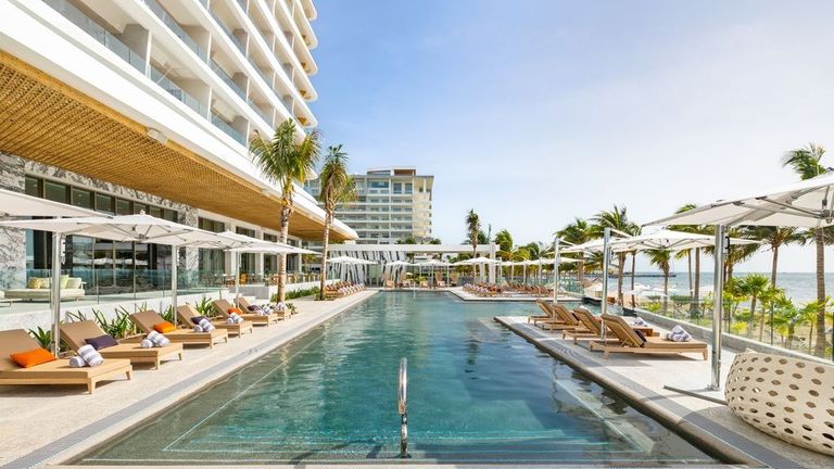 Guests can enjoy the beachfront pool at adults-only hotel Mousai Cancun.
