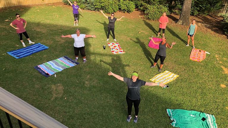 Mooney holds a twice-weekly exercise group in her backyard for her neighbors.