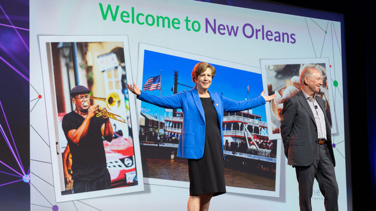 Jackie Friedman (center), president of Nexion Travel Group, and Mike Foster, president of Nexion Travel Group Canada, welcome guests to the annual CoNexion conference