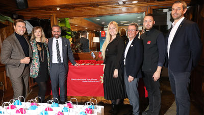 In attendance at Switzerland Tourism’s raclette dinner was Claudio Zemp (left center), the new Director Americas for Switzerland Tourism.