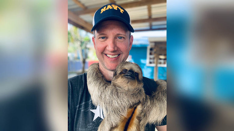 John Chernesky making a friend in Belize
