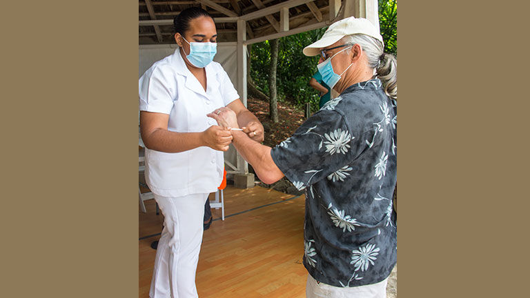 Upon arrival in St. Lucia with Windstar, guests' temperatures were taken and a bracelet identified visitors.