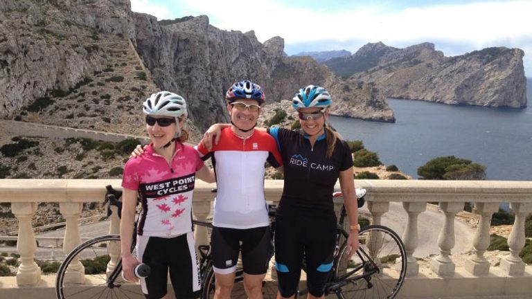 Cycling tours can provide multigenerational-friendly adventure, beautiful scenery and local flavor. Here, Trek Travel cyclists in Mallorca, Spain, enjoy a break. // © 2016 Trek Travel