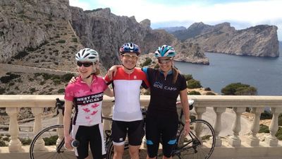 Cycling tours can provide multigenerational-friendly adventure, beautiful scenery and local flavor. Here, Trek Travel cyclists in Mallorca, Spain, enjoy a break. // © 2016 Trek Travel
