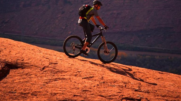 When mountain biking in Moab, Utah, or elsewhere, remember to trust the bike. // © 2016 Visual Communications
