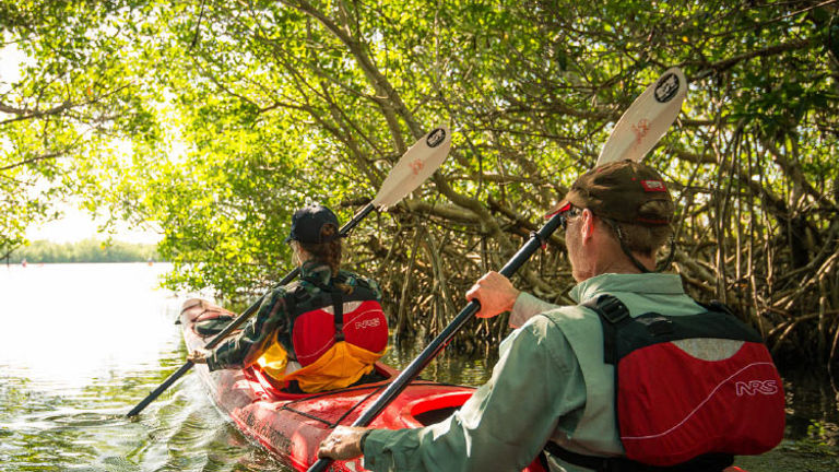 On a ROW trip, clients might kayak in the isolated Guanaroca Lagoon. // © 2016 Chad Case Photography