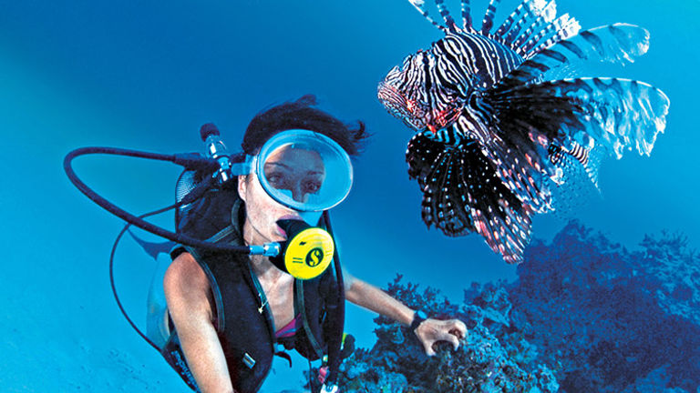 Guests on Paul Gauguin Crusies need not worry about the lack of dive centers on the Marquesas Islands — ships come complete with a divemaster.  // © 2017 Paul Gauguin Cruises