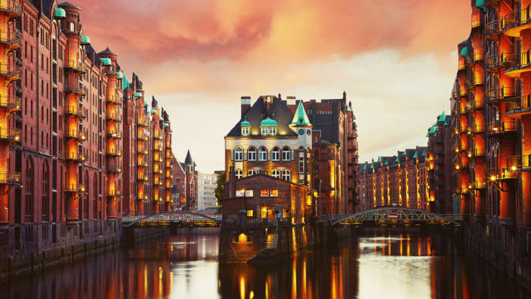 Take a boat tour through Hamburg, Germany's historic Speicherstadt warehouse district. // © 2018 Getty Images