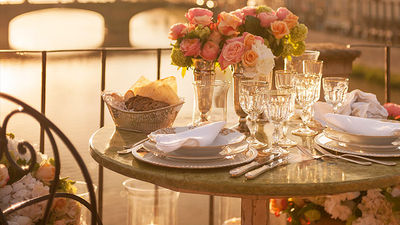 Four Seasons Hotels & Resorts offers “Extraordinary Experiences,” a program with local perspective-focused activities, such as an intimate dinner on the Ponte Vecchio bridge in Florence, Italy. // © 2014 Four Seasons Hotels & Resorts