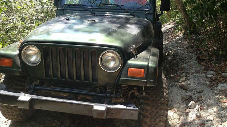 The visit to Tankah Eco Adventure Park began with the opportunity to drive a jeep through jungle trails // © Neal Tornopsky