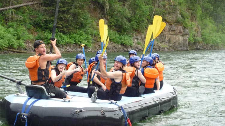 Families go whitewater rafting. // © 2013 Adventures by Disney