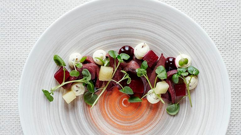 Indulge in Nordic-inspired cuisine at the on-site Ranga Restaurant, such as smoked puffin with spiced cream cheese, beetroot gel and apples. // © 2017 Brent Darby