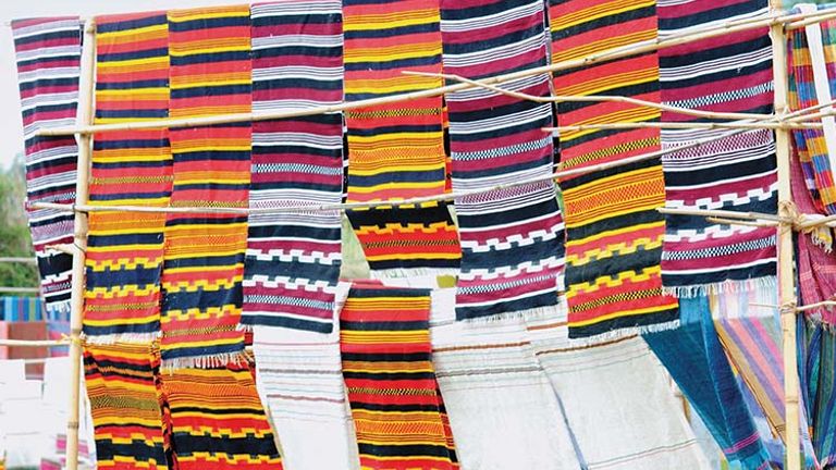 Colorful woven textiles created by people of the Dorze tribe in Arba Minch, Ethiopia // © 2014 Cox & Kings