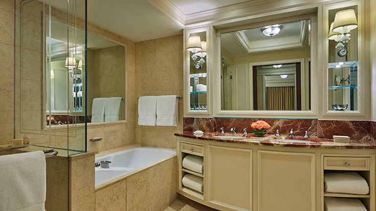 One of two bathrooms in the Ambassador Suite, which includes a soaking tub and a separate shower // © 2015 Christian Horan/Four Seasons Hotel Doha