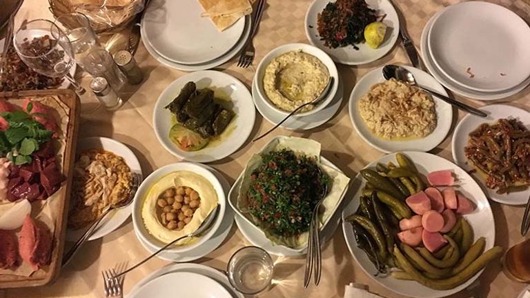 A traditional mezza dinner in Lebanon can take up to four hours and features a variety of hot and cold dishes. // © 2017 Giselle Abcarian