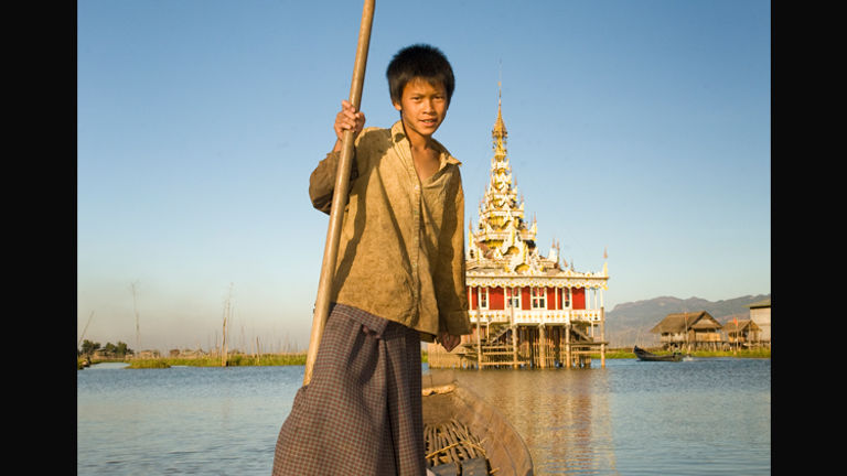 A young fisherman on Inle Lake in Myanmar // © 2010 Mark Edward Harris
