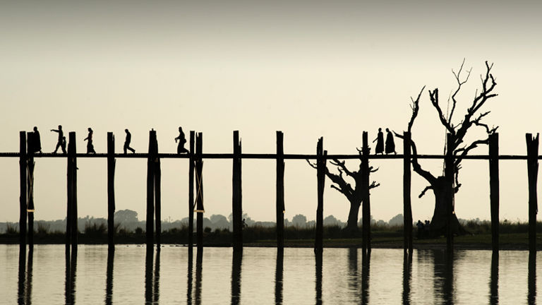 The world’s longest teak bridge is located in Mandalay, Myanmar. // © 2010 Mark Edward Harris