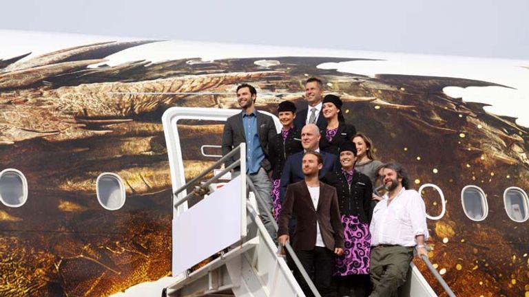 Director Peter Jackson (bottom right) at the unveiling of the Smaug plane at LAX // © 2013 Cody Geib