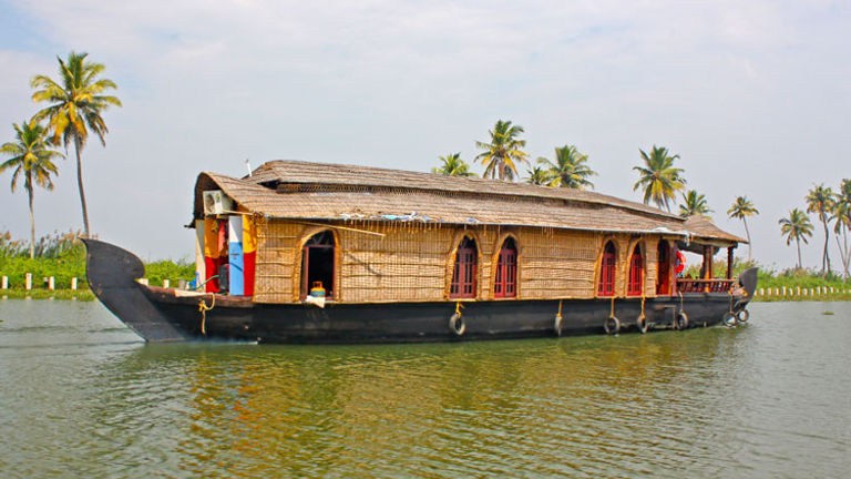 Rice boats are a great way to explore Kerala’s backwaters// (C) 2013 Shutterstock
