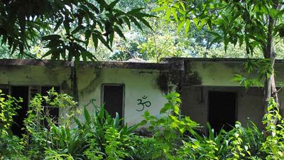 The ashram where The Beatles learned Transcendental Meditation by Maharishi Mahesh Yogi is closed, but fans find ways to enter and pay respects. // © 2014 Mindy Poder