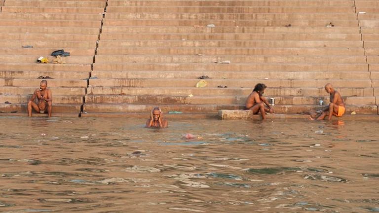 The river is used not just for holy purposes, but for bathing and washing clothes as well. // © 2014 Mindy Poder