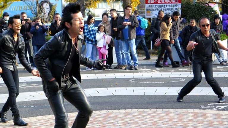 In Tokyo’s Yoyogi Park, troops of dancing rockabillies entertain crowds with their Elvis-like costumes and dance moves. // © 2014 Boutique Japan