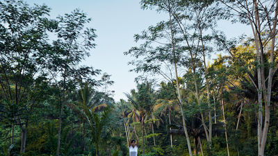 At Kayumanis Ubud, a luxury resort on Bali’s Ayung River, guests can participate in outdoor morning yoga sessions. // © 2014 Kayumanis