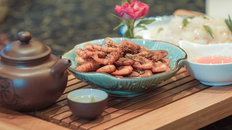 Long Jing shrimp, fried and flavored with Long Jing tea, is a Hangzhou favorite. // © 2014 Hangzhou Tourism Commission