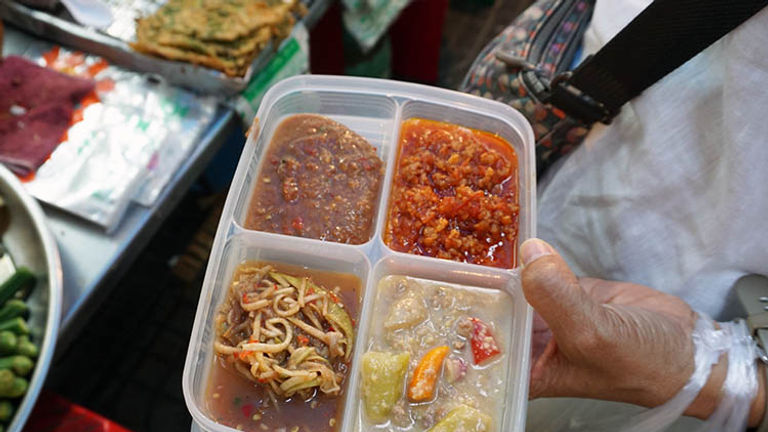 Different chili sauces, also known as nam prik, showcase Thai locals’ love of fiery spice. // © 2017 Valerie Chen